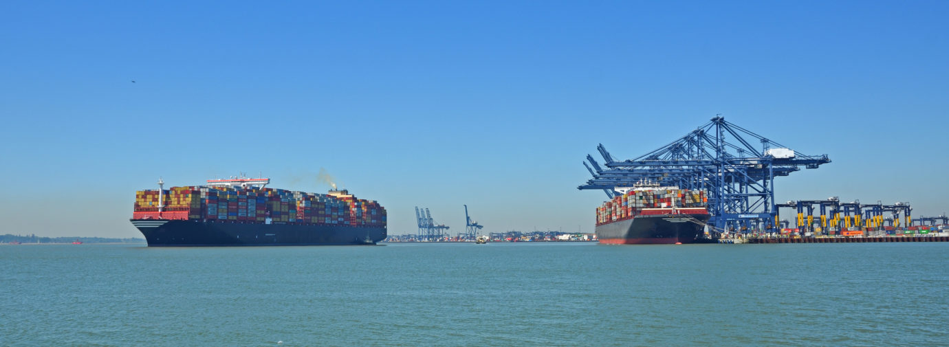 Two Large Containers ship one leaving the Orwell estuary at Fel