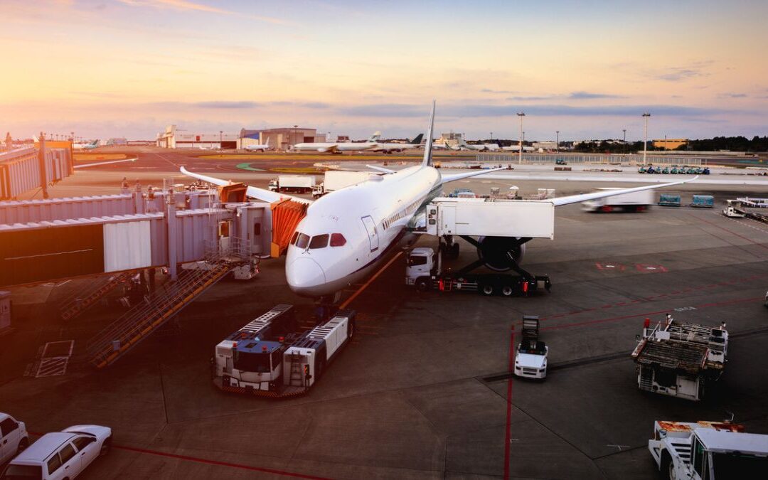 A cargo plane being loaded, representing air freight and global logistics.